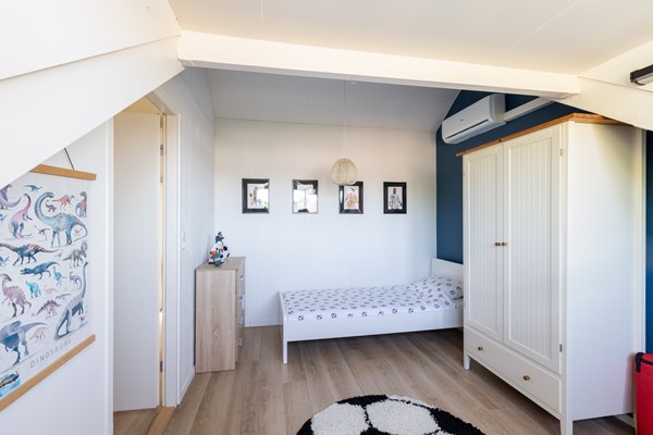 Foto - Te koop: Nette tussenwoning in het gezellige Klundert!